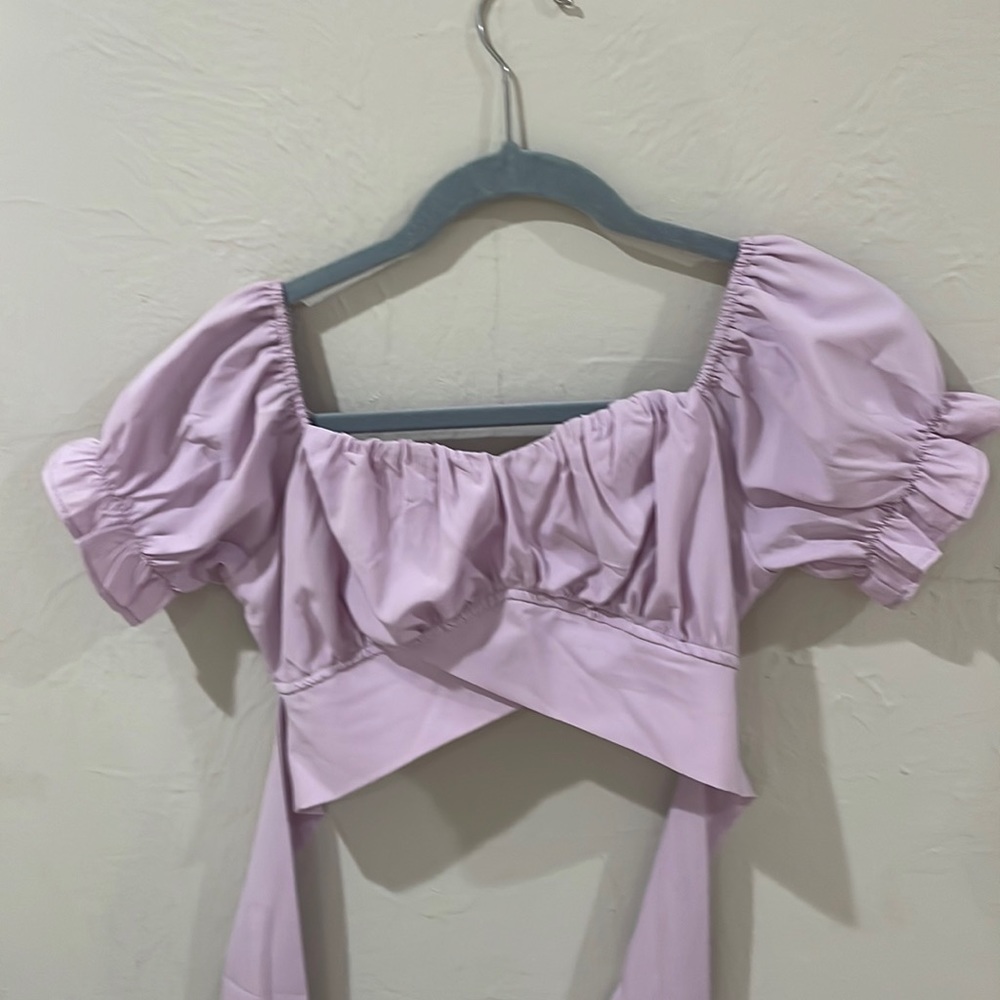 Purple top, slightly cropped with tie in the back